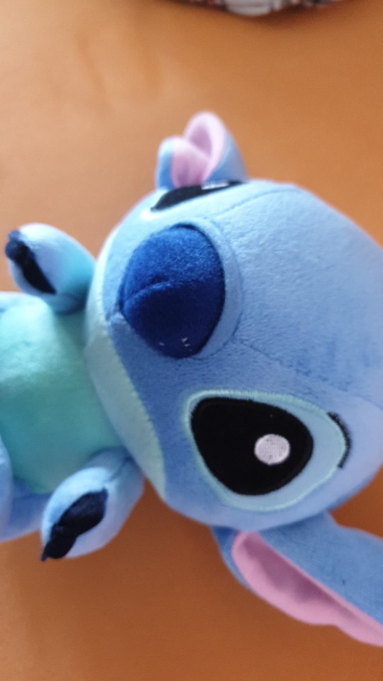 Detail Boneka Stitch Galau Nomer 16