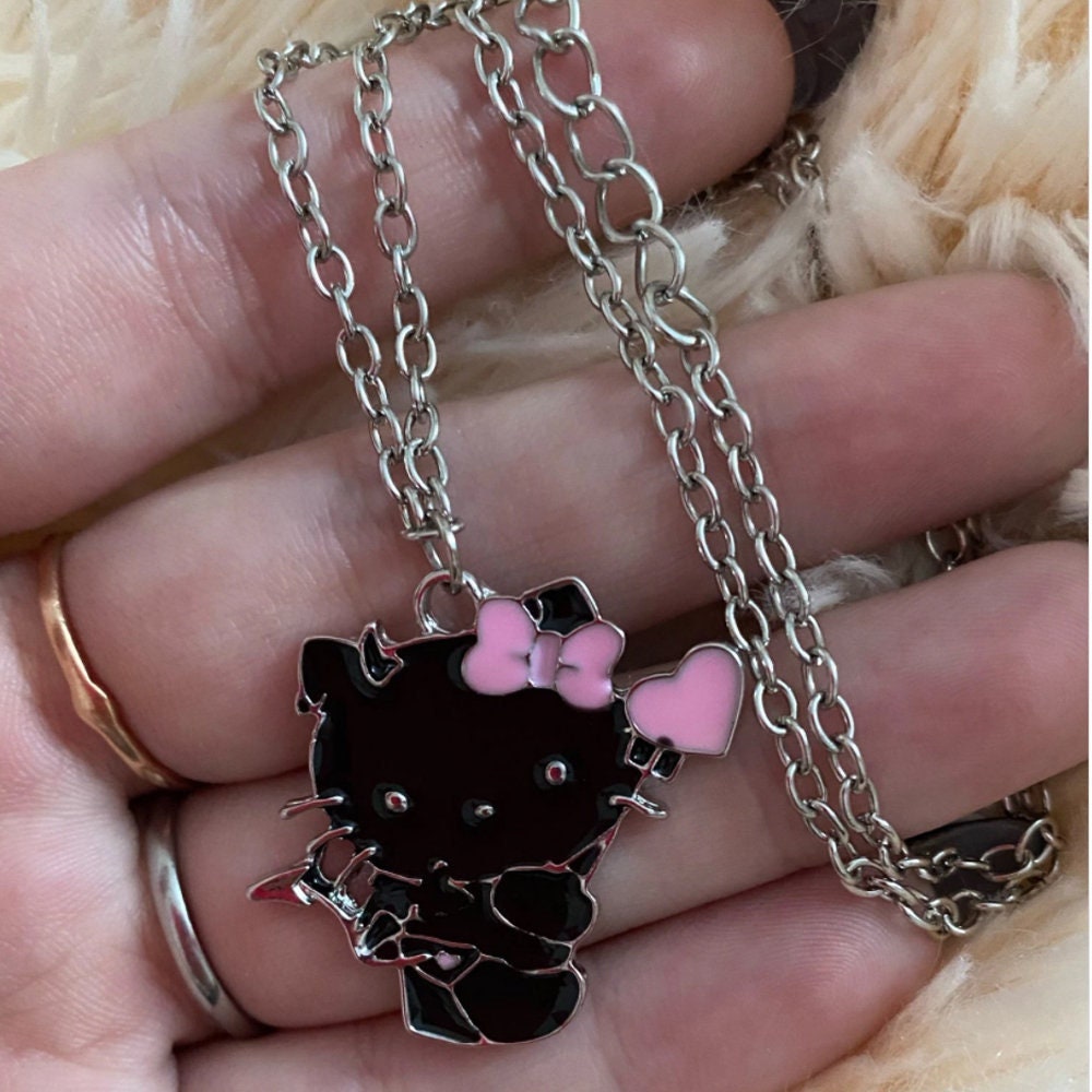 Detail Hello Kitty Devil Nomer 13