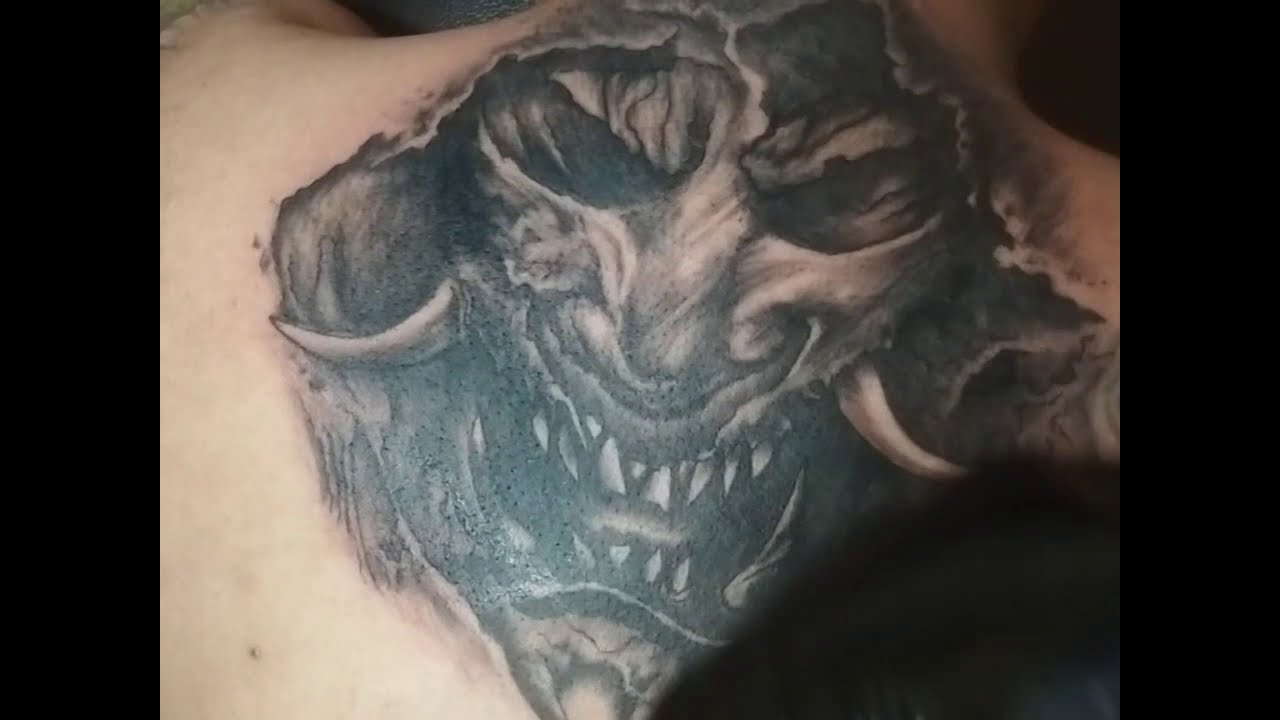 Detail Tato Tengkorak Di Punggung Nomer 3