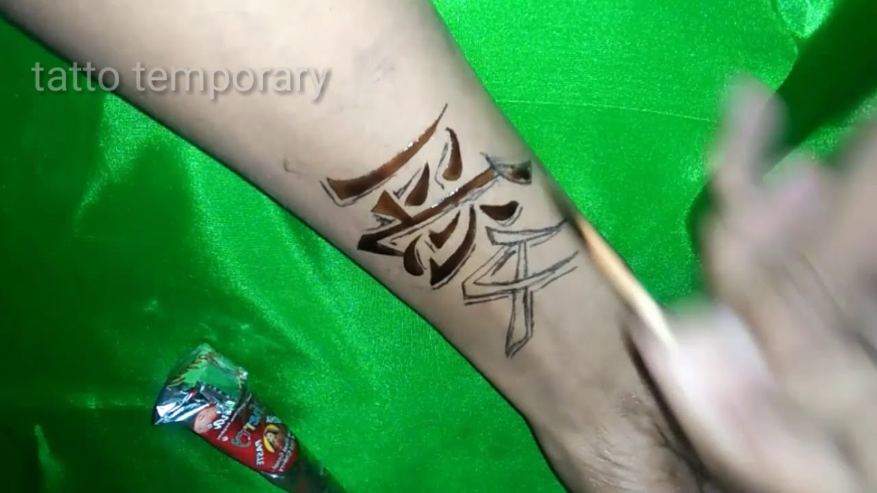 Detail Tato Tulisan Jepang Di Tangan Nomer 12