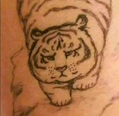 Detail Tatto Macan Nomer 31