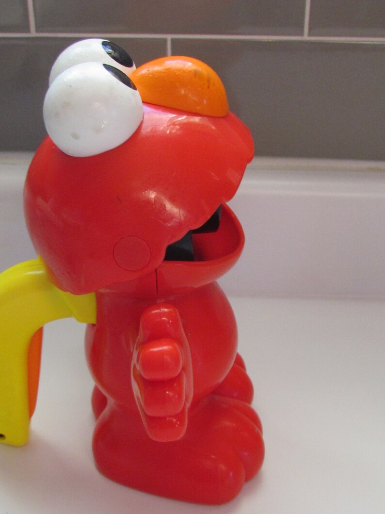 Detail Elmo Flashlight Nomer 59