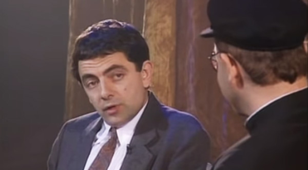 Detail Elton John Rowan Atkinson Nomer 12