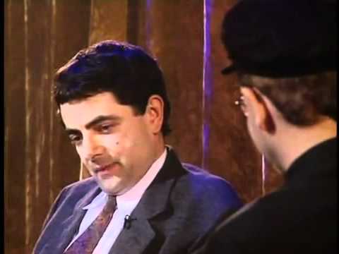 Detail Elton John Rowan Atkinson Nomer 13