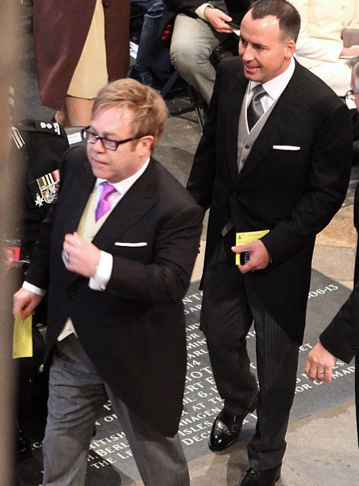 Detail Elton John Rowan Atkinson Nomer 23