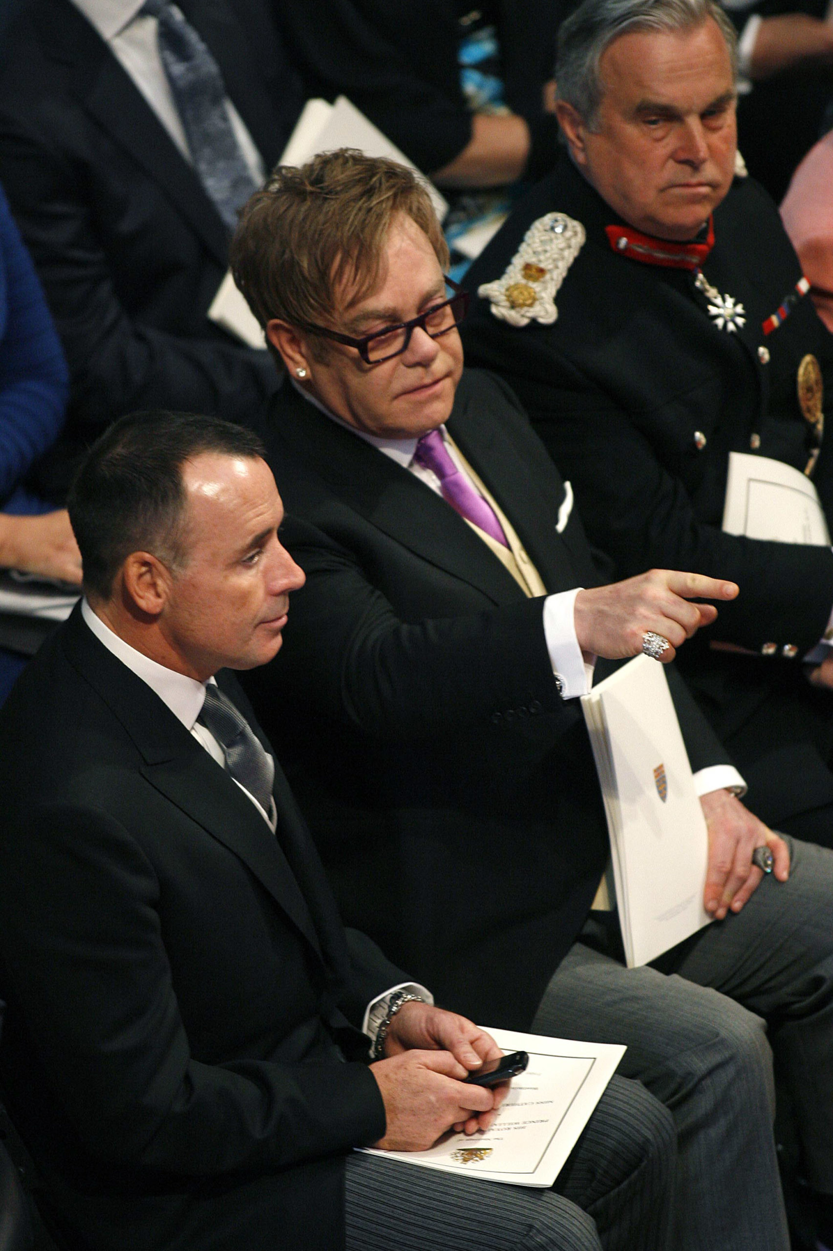 Detail Elton John Rowan Atkinson Nomer 33