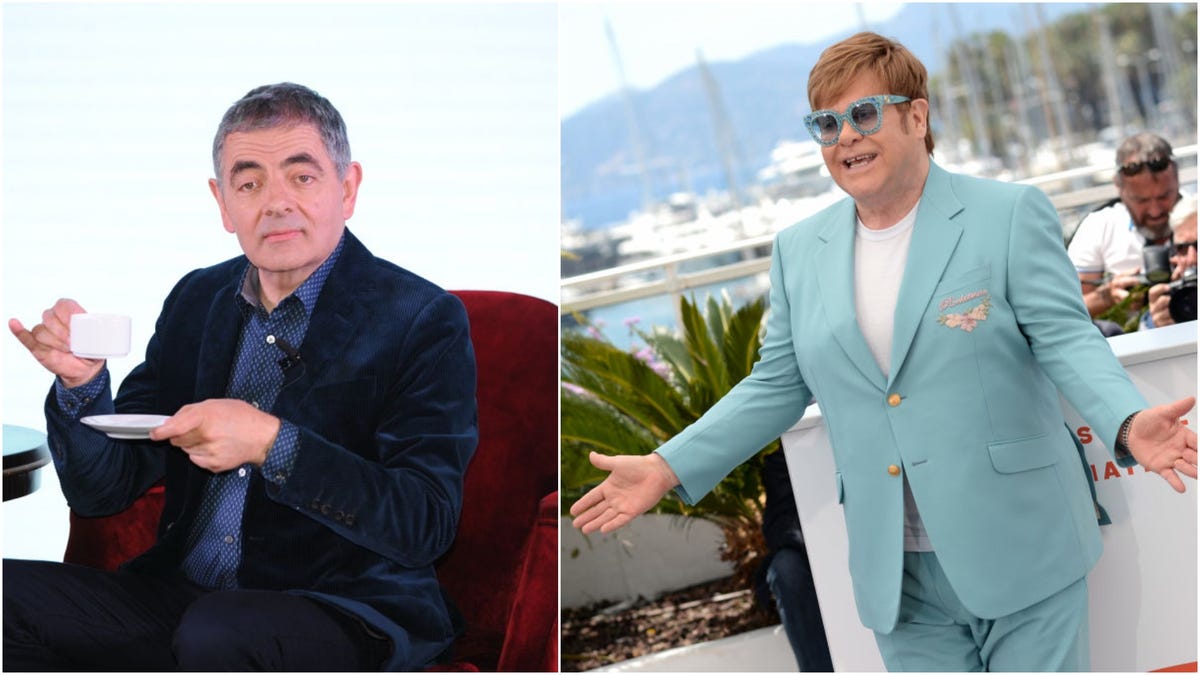 Detail Elton John Rowan Atkinson Nomer 34