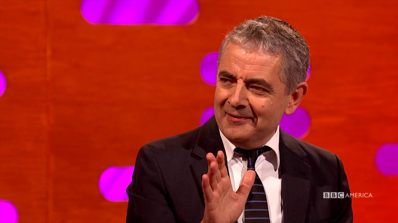 Detail Elton John Rowan Atkinson Nomer 41