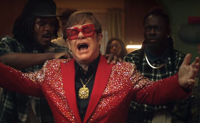Detail Elton John Rowan Atkinson Nomer 49