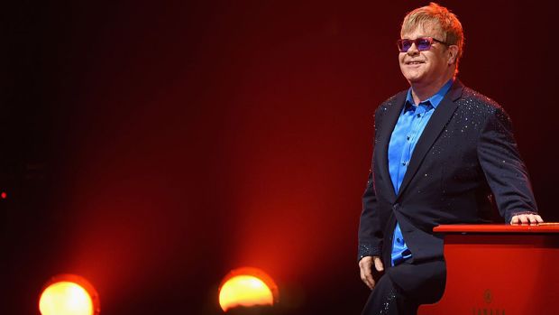 Detail Elton John Rowan Atkinson Nomer 56
