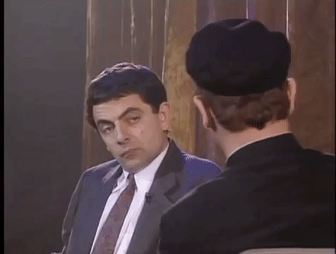 Detail Elton John Rowan Atkinson Nomer 10