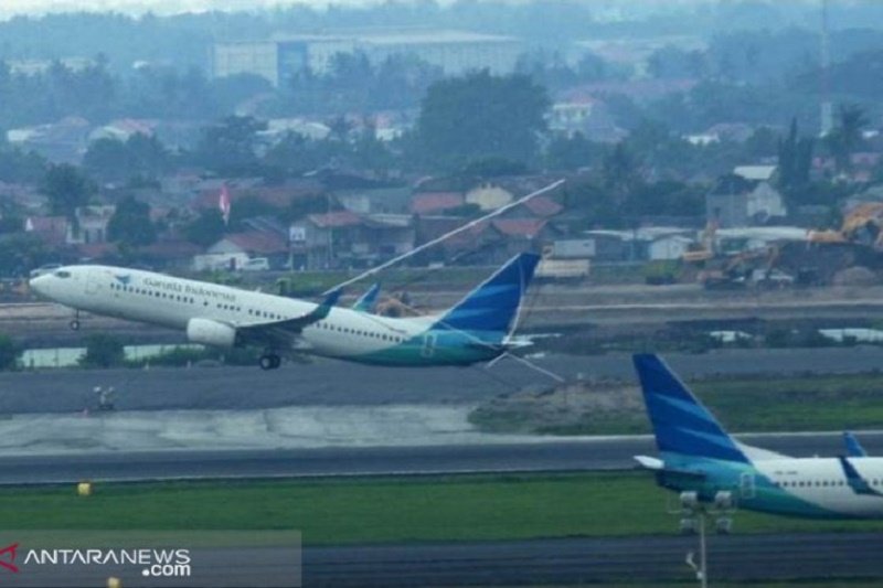 Detail Foto Dalam Pesawat Garuda Nomer 38