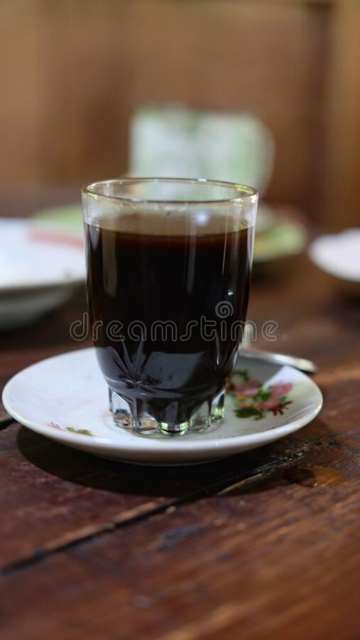 Detail Foto Kopi Hitam Di Gelas Nomer 13