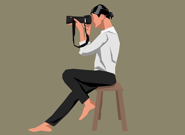 Detail Foto Orang Pegang Kamera Nomer 39