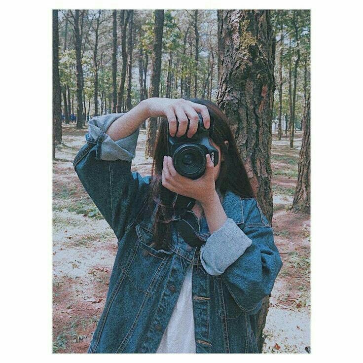 Detail Foto Orang Pegang Kamera Nomer 40