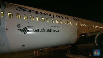 Detail Foto Tiket Pesawat Garuda Indonesia Nomer 16