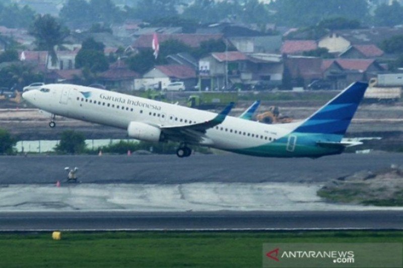 Detail Foto Tiket Pesawat Garuda Indonesia Nomer 26