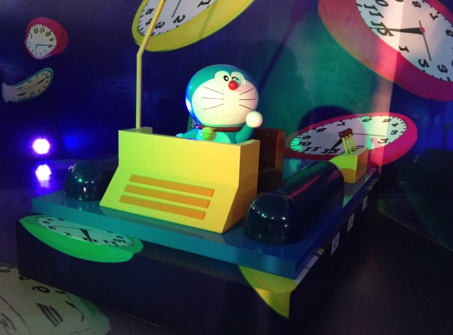 Detail Gambar Doraemon Naik Mesin Waktu Nomer 9