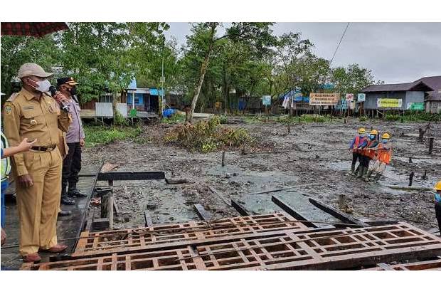 Detail Gambar Jalanan Dari Kayu Di Kabupaten Asmat Nomer 20