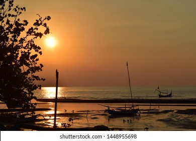 Detail Gambar Matahari Terbenam Di Pantai Nomer 57