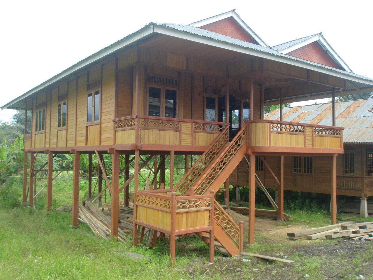 Detail Gambar Rumah Kayu Manado Nomer 10
