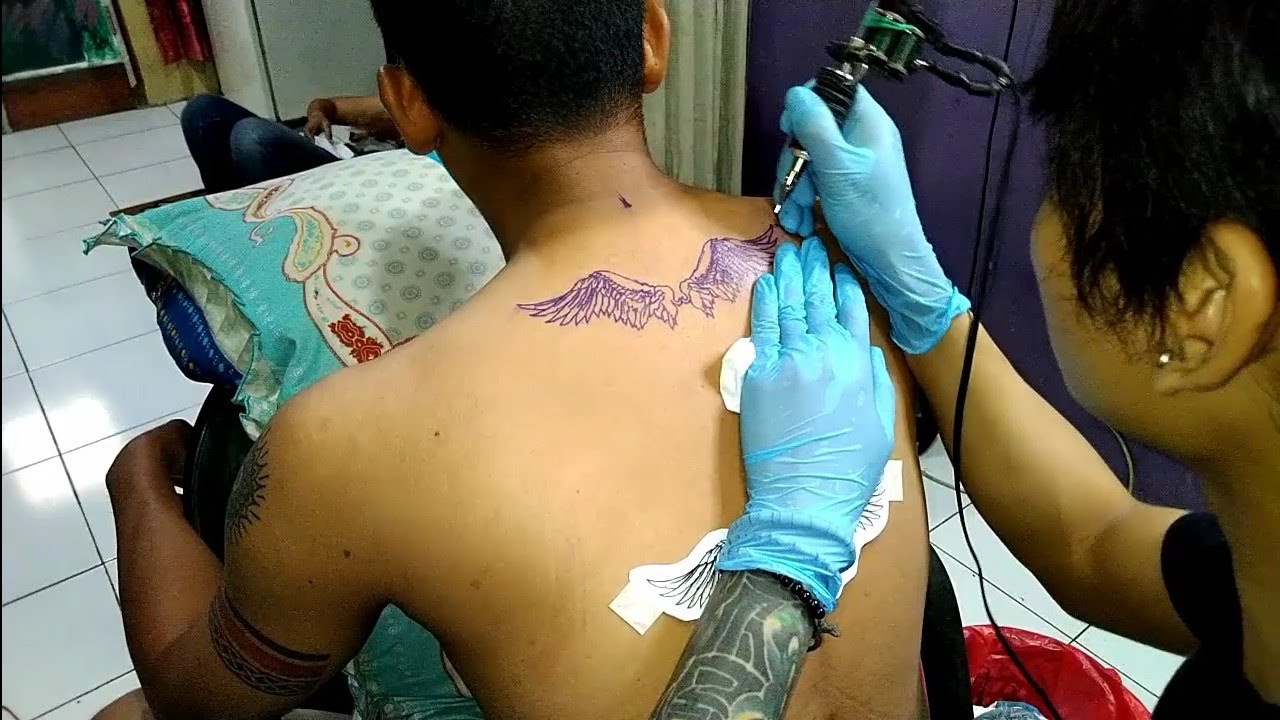 Detail Gambar Tato Di Punggung Simpel Nomer 52