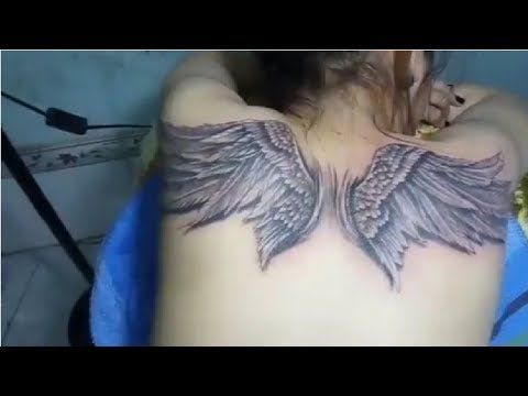 Detail Gambar Tato Sayap Di Punggung Nomer 8