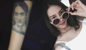 Detail Gambar Tato Wajah Di Lengan Nomer 33