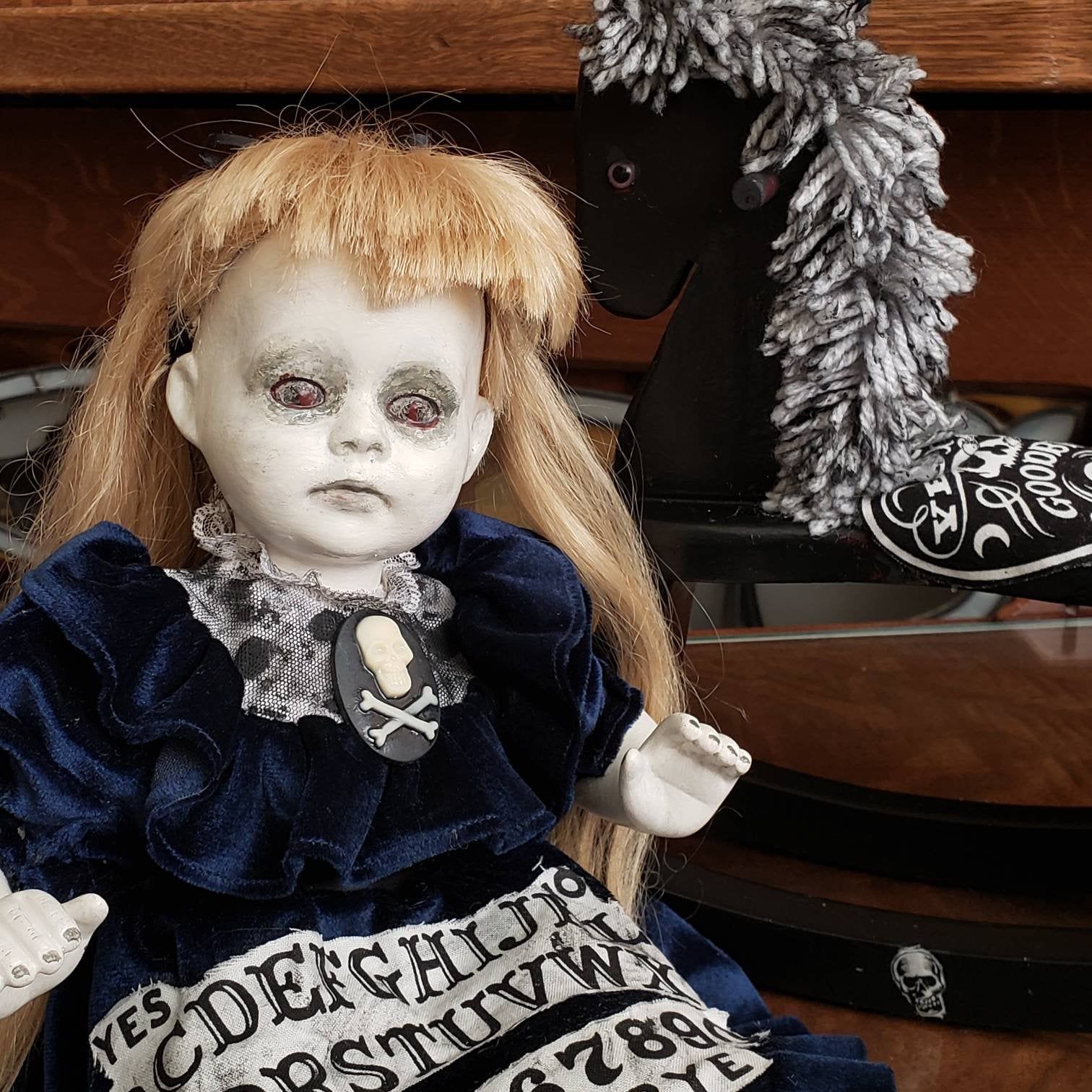 Detail Animated Demon Doll On Rocking Horse Nomer 17