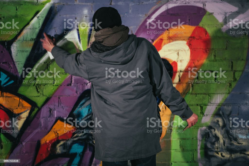 Detail Graffiti Artist At Work At Night Nomer 13