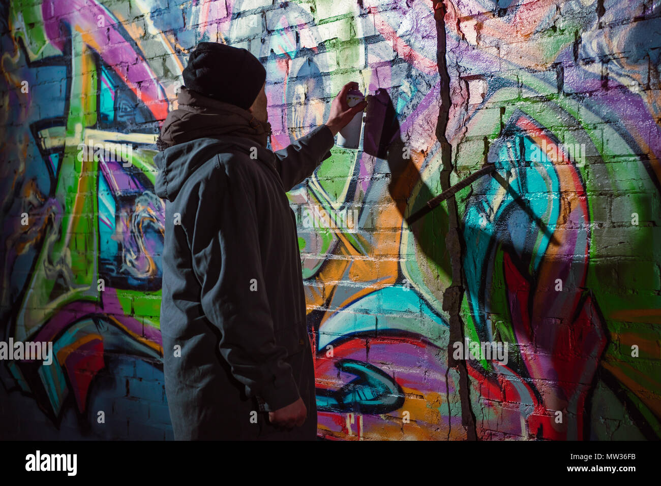 Detail Graffiti Artist At Work At Night Nomer 3