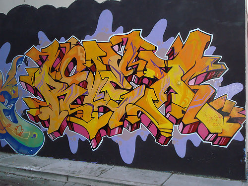 Detail Graffiti Papan Jalan Nomer 23