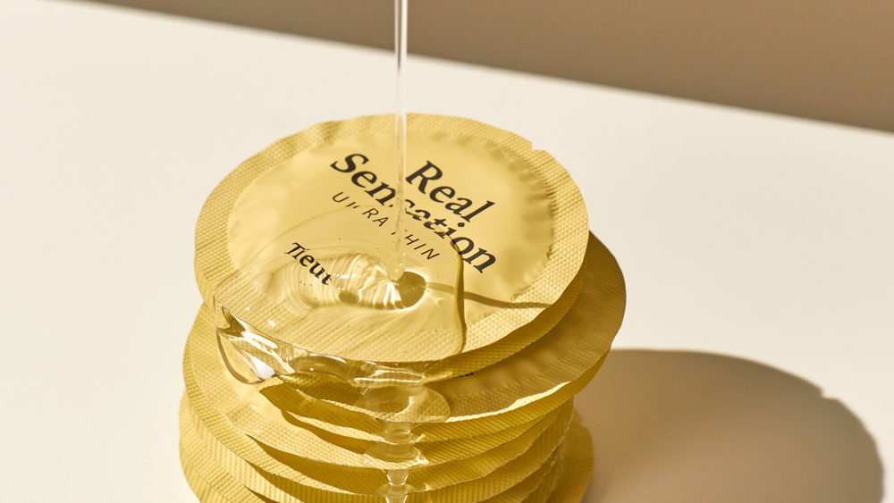 Detail Gold Circle Coin Condom Nomer 44