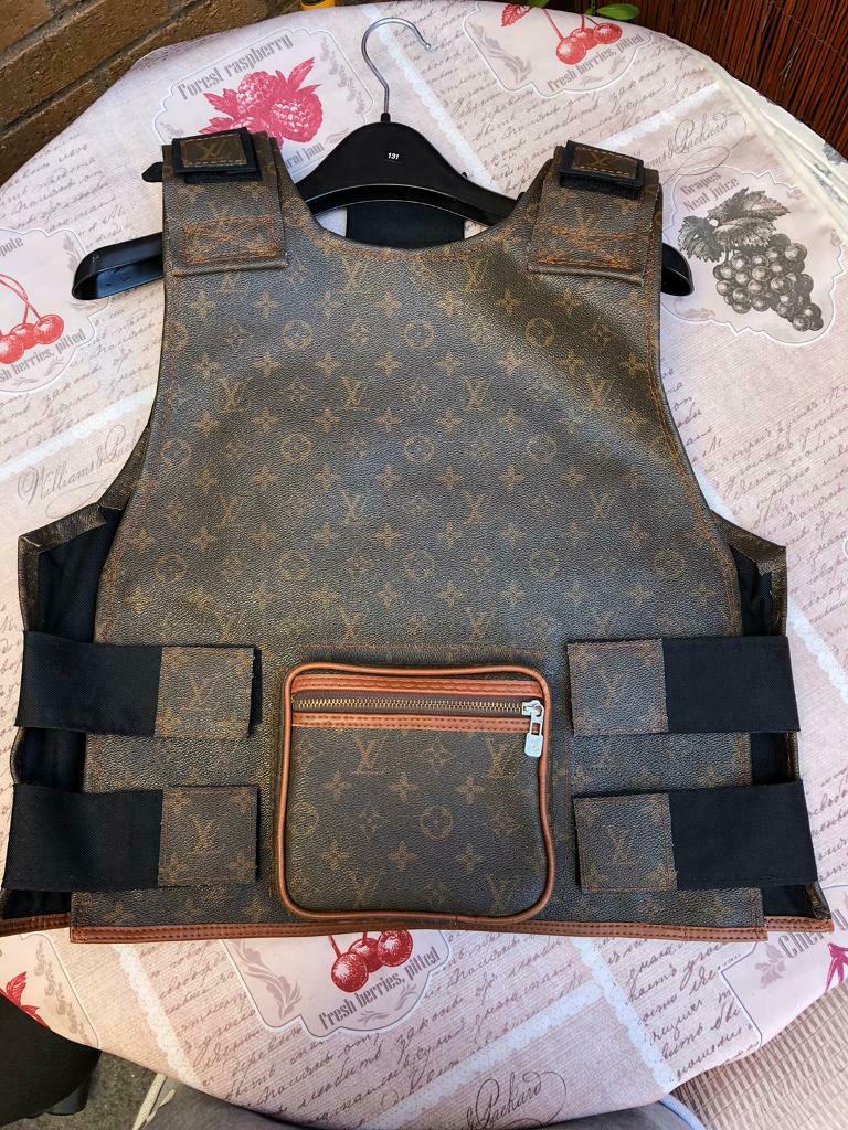 Detail Gucci Bulletproof Vest Nomer 39