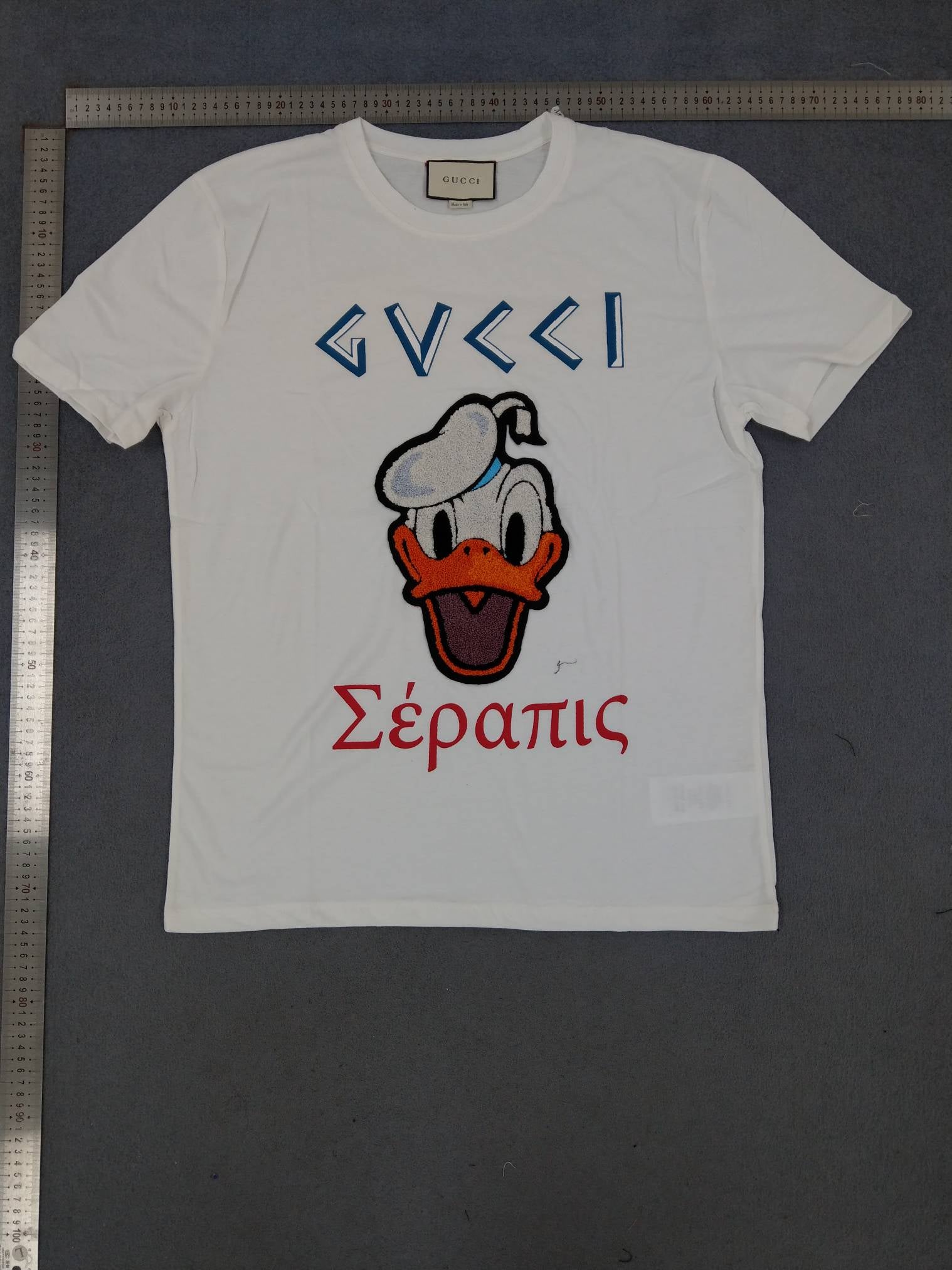 Detail Gucci Donald Duck T Shirt Nomer 32