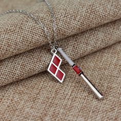 Detail Harley Quinn Bat Necklace Nomer 20