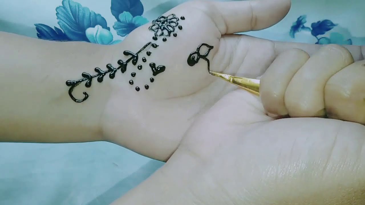 Detail Henna Tangan Bunga Simple Nomer 23