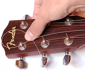 Detail How To String A Guitar Pictures Nomer 13