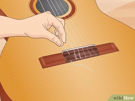 Detail How To String A Guitar Pictures Nomer 47