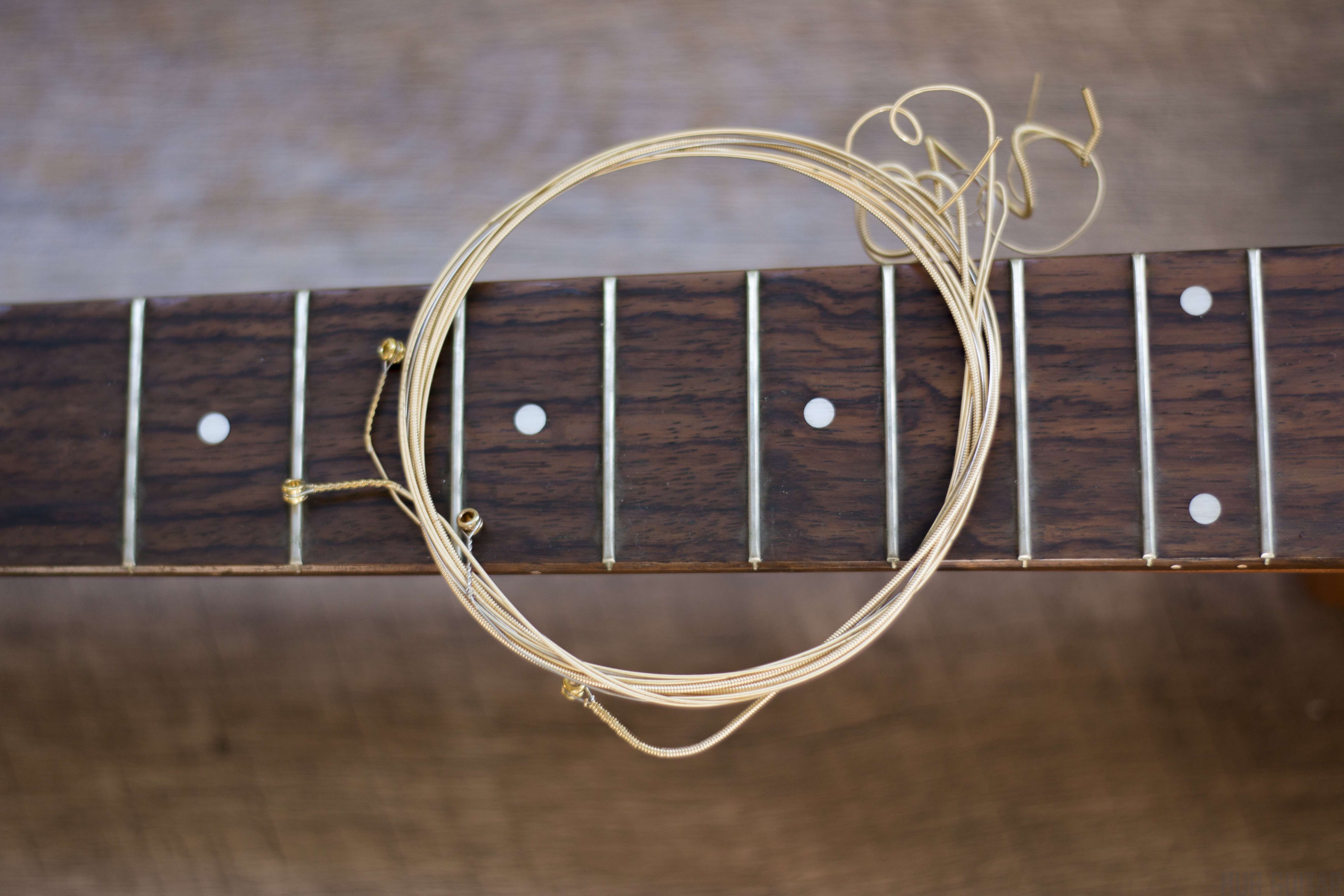 Detail How To String A Guitar Pictures Nomer 9