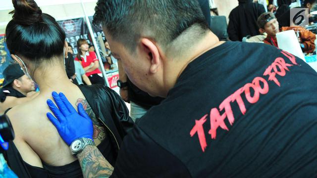 Detail Kontes Tato Wanita Nomer 14