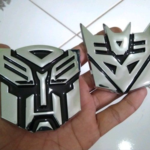 Detail Lambang Autobot Dan Decepticon Nomer 24