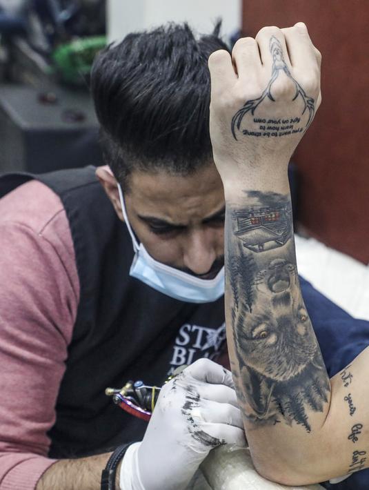 Detail Desain Tato Di Lengan Atas Nomer 32