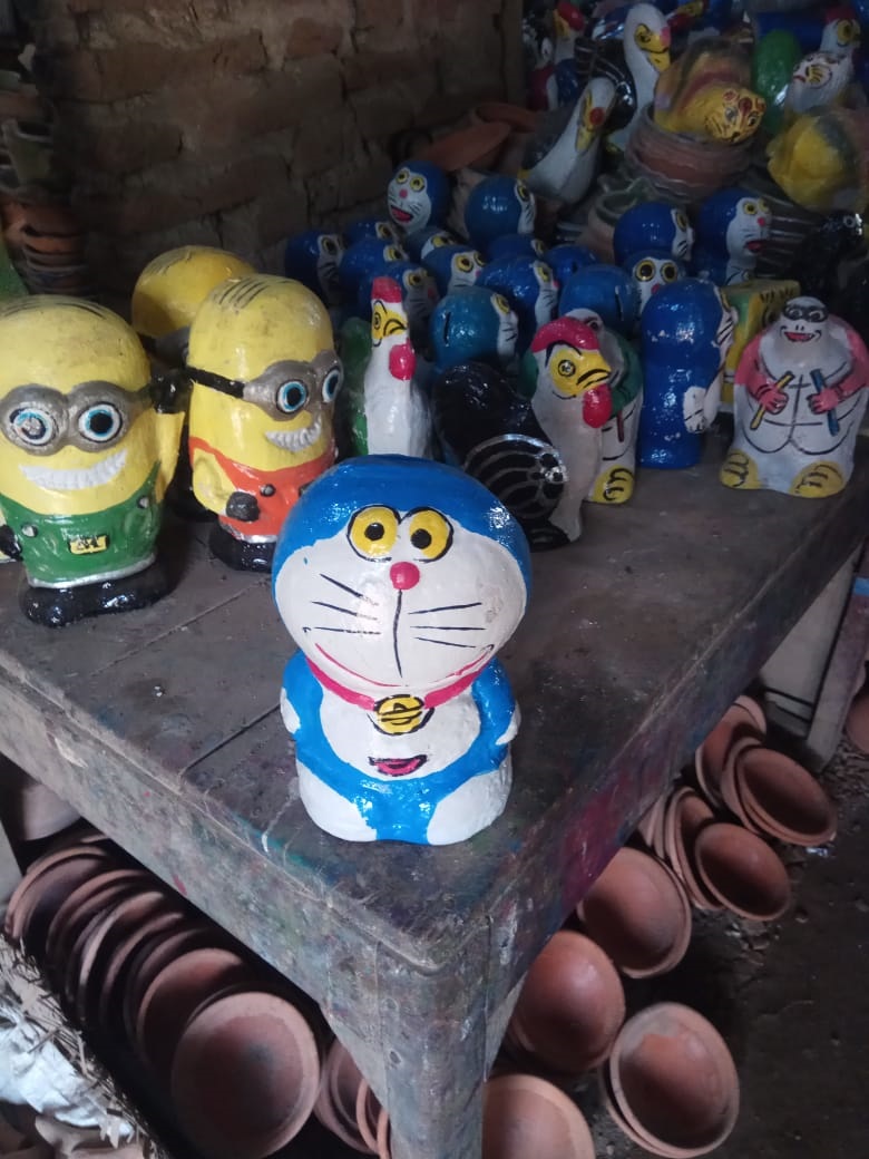 Detail Patung Doraemon Dari Tanah Liat Nomer 46