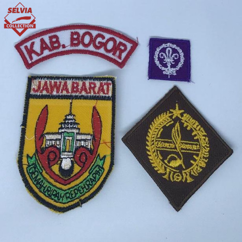 Detail Posisi Emblem Pramuka Nomer 33
