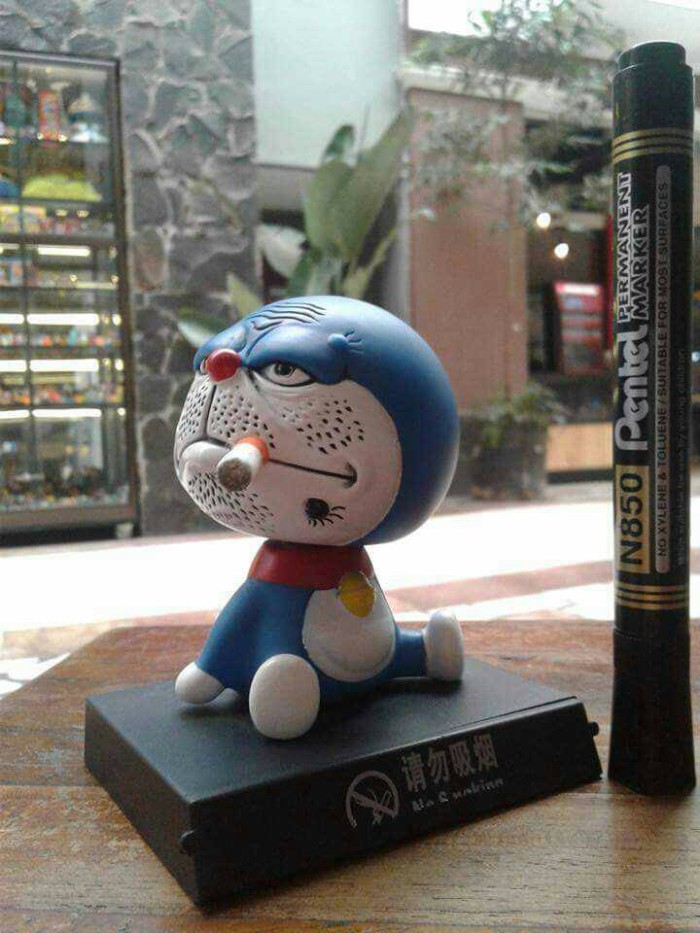 Detail Doraemon Ngerokok Nomer 51