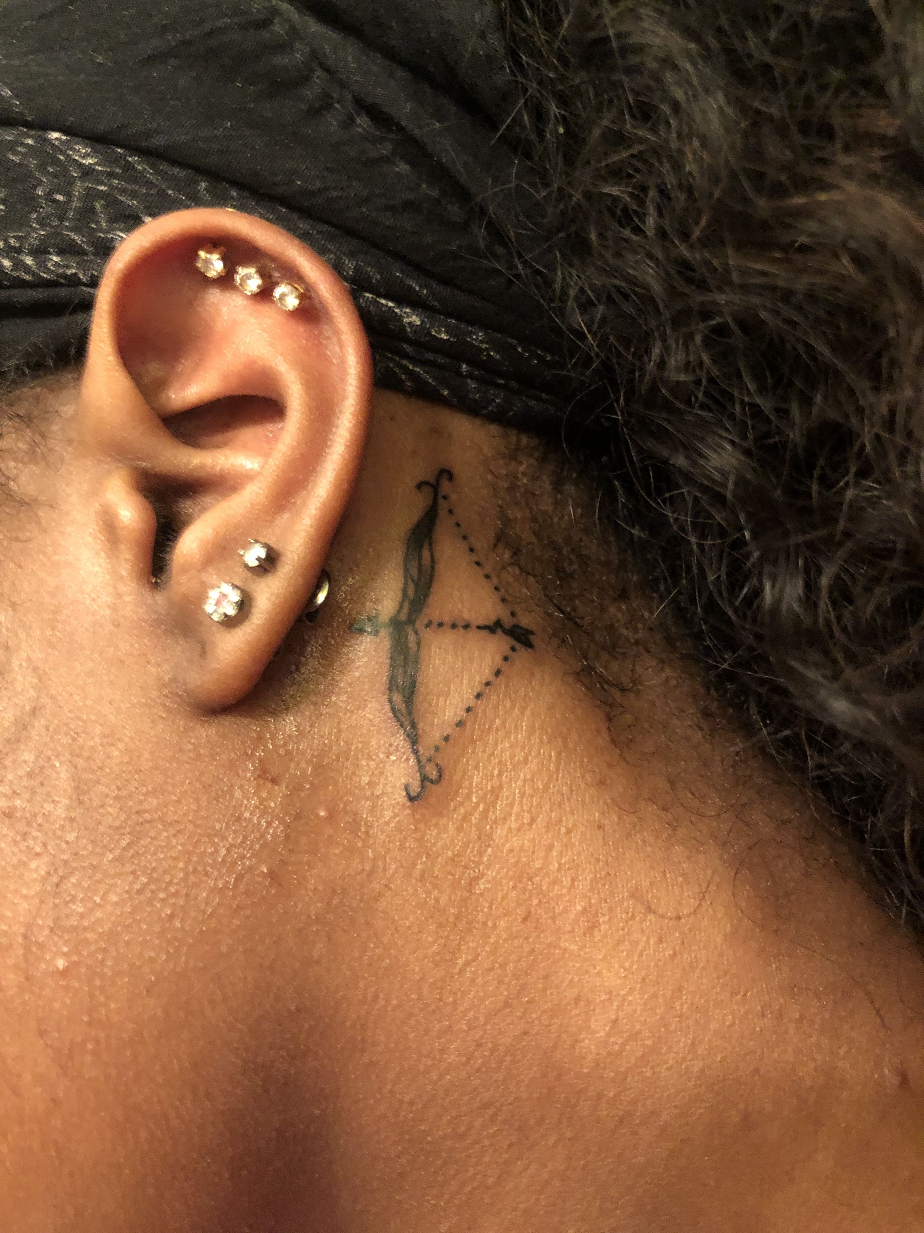 Detail Sagittarius Tattoo Behind Ear Nomer 5