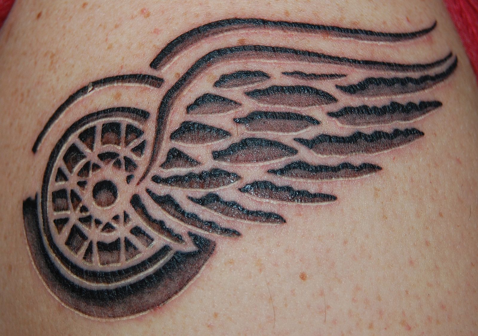 Detail Winged Motorcycle Wheel Tattoo Meaning Nomer 25