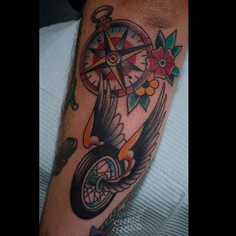 Detail Winged Motorcycle Wheel Tattoo Meaning Nomer 28