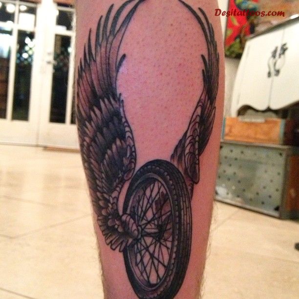 Detail Winged Motorcycle Wheel Tattoo Meaning Nomer 31
